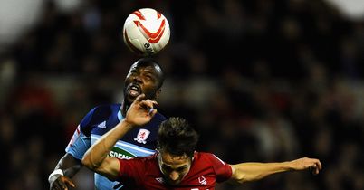 Battle: Boro's Andre Bikey and Forest's Chris Cohen vie for the ball